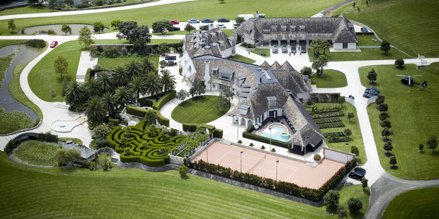 FILE - In this Jan. 20, 2012 file photo an aerial shot of Kim Dotcom's house is shown in Coatesville, north west of Auckland, New Zealand.  On his way up, he fooled them all: journalists, judges, investors and companies. Then the man who renamed himself Kim Dotcom finally did it. With an eye for get-rich schemes and an ego gone wild, he parlayed his modest computing skills into a mega-empire, becoming the fabulously wealthy computer maverick he had long claimed to be. (AP Photo/NZ Herald, Natalie Slade, File) NEW ZEALAND OUT, AUSTRALIA OUT